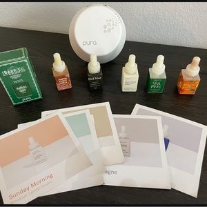 Pura plug in with scent vials and scratch cards